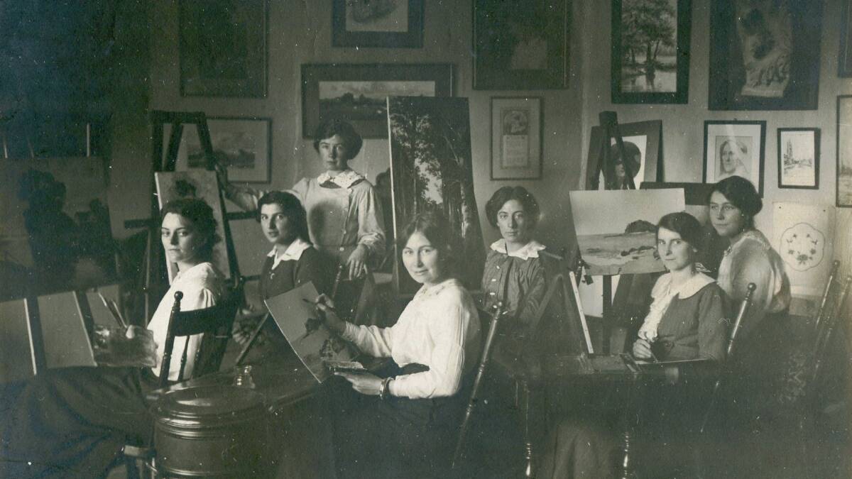 REDISCOVERED: Ethel Clara Liggins conducting an art class in the early 20th century. She set up a studio in Auburn Street, where she taught painting, drawing and craft. 