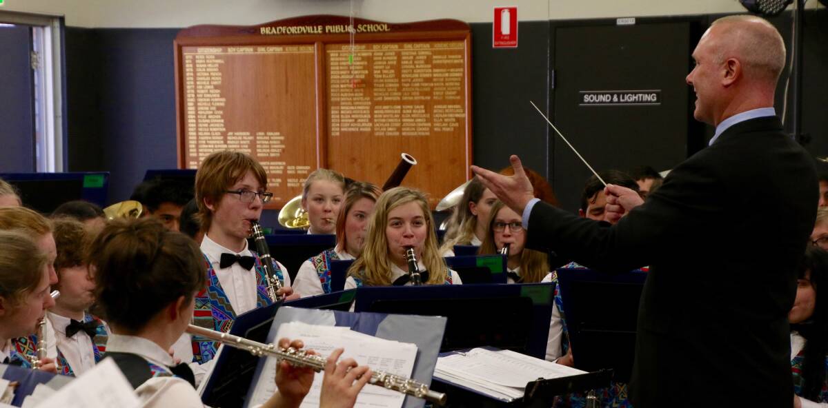 IN TUNE: Canberra's Instrumental Music Program senior concert band entertained a few Goulburn schools last week. Photo: David Cole