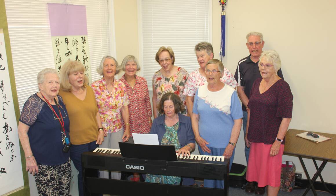 CHOIR: One of the U3A choirs in full song. (Left) Pat Spilsbury, Christina Coombs, Marian McDonald, Jacqui Kruger, Jan Bladwell, Kerrie Sheely, Ron Bladwell and Jean Lloyd. (Front) Helen Lowe and Rosalie Williams. Photo David Cole. 