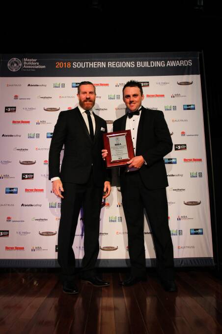 HONOUR: Mitch Hogan from MP Hogan Homes and Constructions (right).