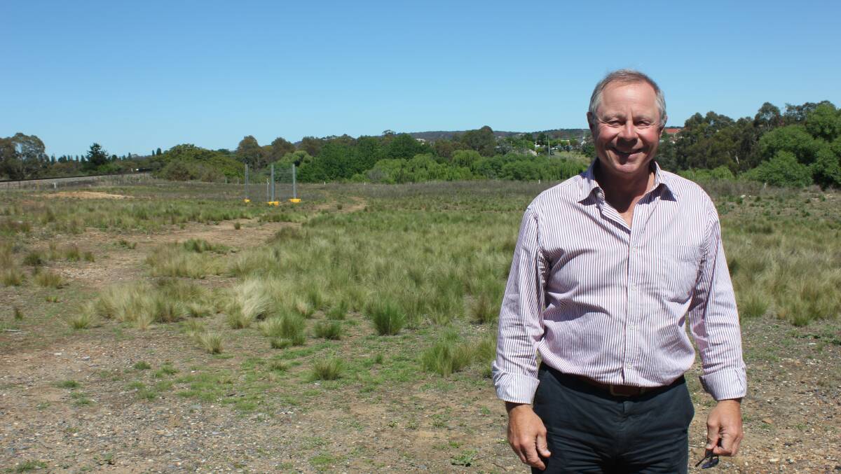 DELAY: Community Energy for Goulburn president Ed Suttle at the site of the proposed Goulburn Solar Farm, near the railway line at North Goulburn. 