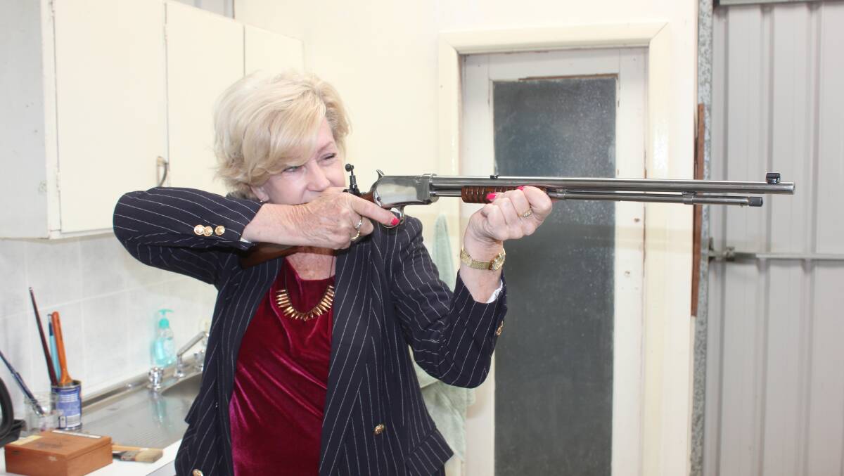 Ann Skeed from Marulan is a recent convert to shooting from a recent Try Shooting Day at the Goulburn Rifle Range. She is holding a 1906 pump-action Winchester rifle. 