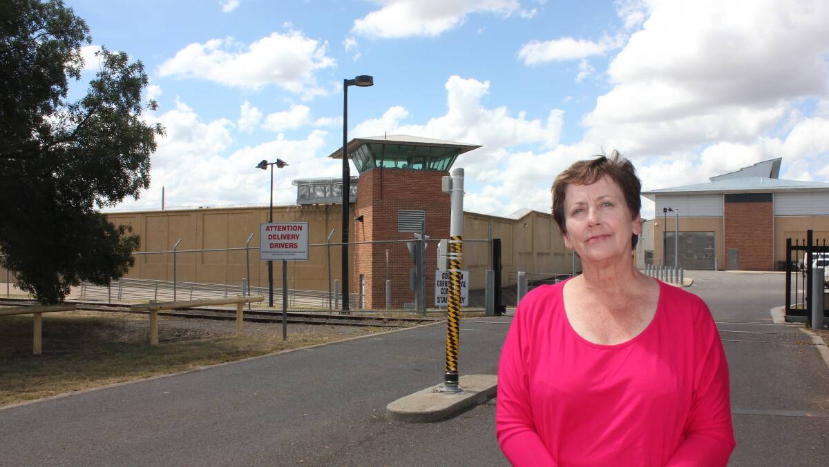 WALK OUT: Dr Ursula Stephens outside the Supermax in Goulburn this morning. Notice the unmanned tower and one of the gates wide open at Australia's highest security prison. Photo David Cole. 