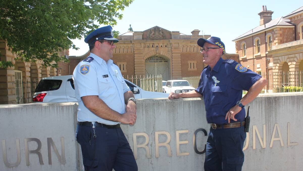 VALUABLE WORK: Goulburn Correctional Complex manager of industries Mark Derwent and senior overseer electrician John Canty at the jail on Tuesday. Photo David Cole. 