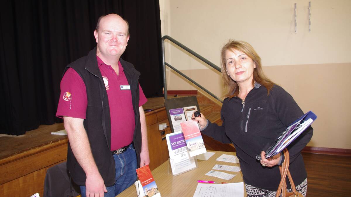 VOLUNTEERS: St Saviour's volunteer Stephen RelF giving information to Ivy Estaphan at the recent Volunteer Expo in Goulburn.