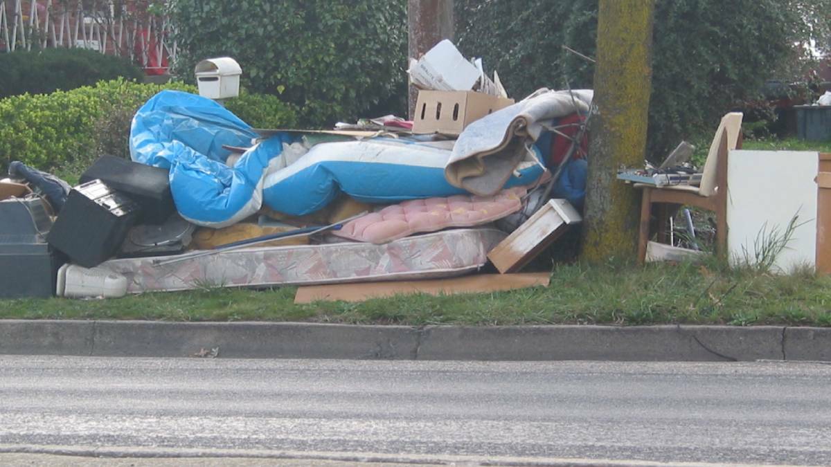 REJECTED: This pile of waste would be rejected in the Council Clean Up as mattresses and e-waste must be taken to Goulburn Waste Management Centre separately. Piles must also be stacked neatly at the kerb, no more than two cubic metres in size and each item must be easily lifted by two people. 
