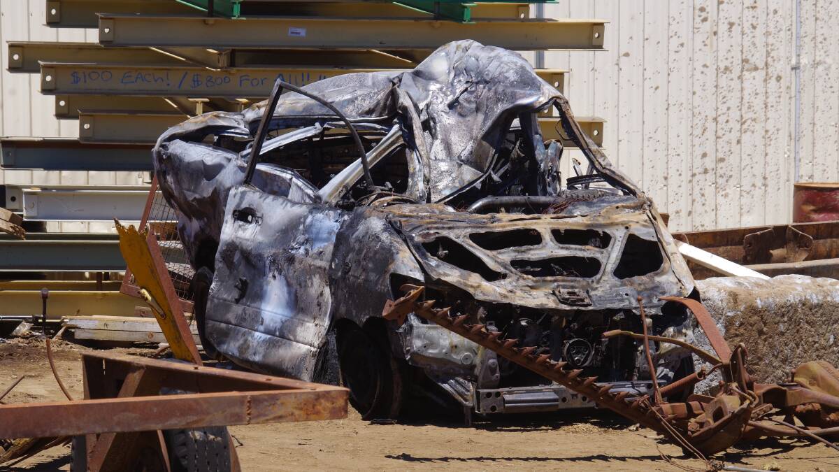 Car catches fire in scrap metal yard
