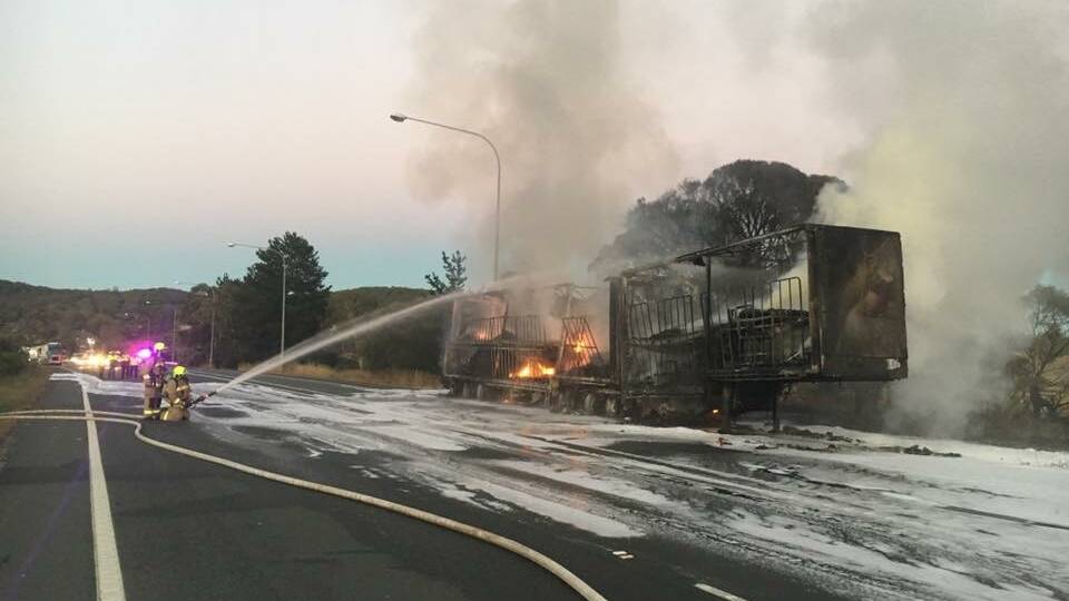 TRUCK FIRE: The B-Double truck that was destroyed by a blaze on the Hume Highway at Boxer's Creek, early on Saturday morning This photo was taken by the Towrang Rural Fire Brigade. 