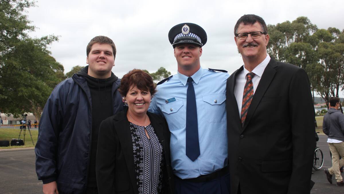 Proud moment: Probationary Constable Jackson Weeks' proud moment with family (L-R) Riley, Kim and Mick on attesting last Friday. Photo: David Cole
