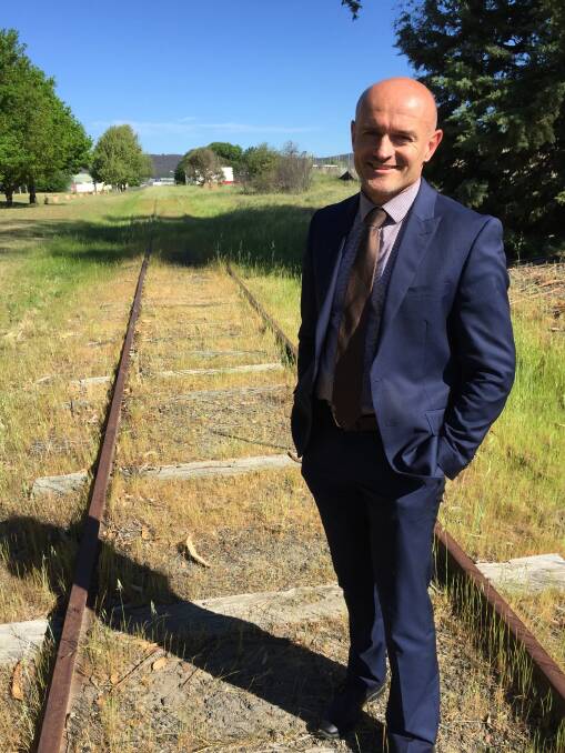MOVING ALONG: Goulburn Mulwaree operations director Matt O’Rourke on a section of the former Crookwell to Goulburn Railway Line near Riversdale. Photo David Cole. 