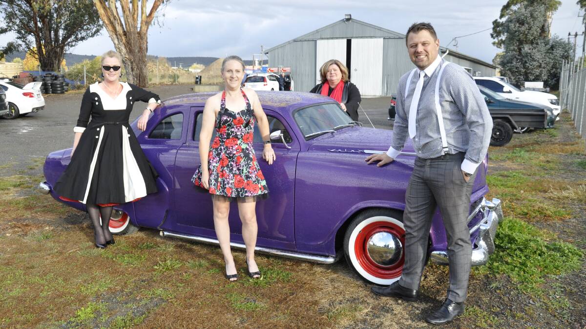 ROCKABILLY REBELS: Getting into the 1950's Rockabilly spirit in front of this classic car were Bernadette Hilton, Jo Harris, Jacqueline Gore and Matt Lloyd. Photo David Cole. 