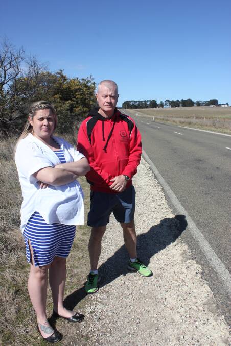 NO SPACE: Lauren Firth and David Smithson at one of the spots on Windellama Road where children alight from the school bus. Photo David Cole 
