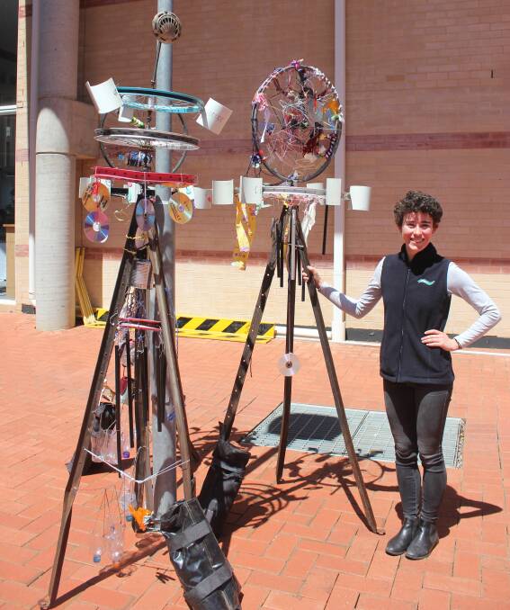 UPCYCLING: Goulburn Mulwaree waste education officer Hannah Cotton at the Waste to Art exhibition in the Caroline Chisholm Courtyard. Photo David Cole.