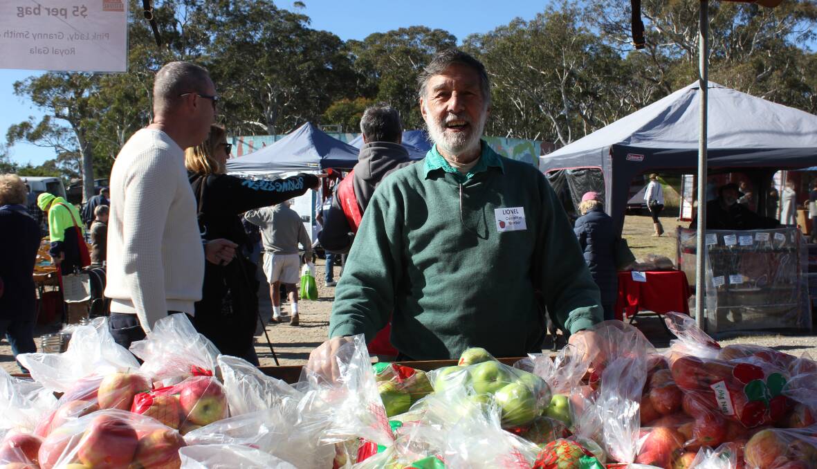 APPLE MAN: Indefatigable Lionel Willison manned the apple cart and was very busy selling apples all day.
