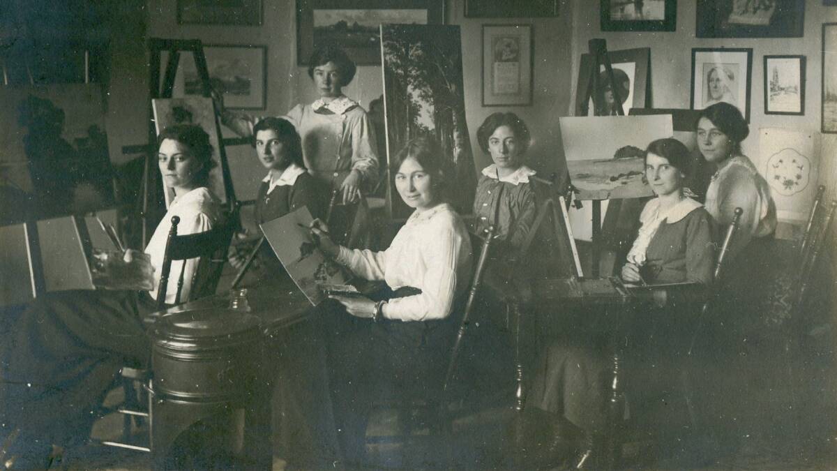 Artist rediscovered: Ethel Clara Liggins conducting an art class in the early 20th century. She set up a studio in Auburn Street, where she taught painting, drawing and craft. Photo: Jim Brown, supplied by Margaret Kearns.