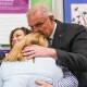 Scott Morrison kisses wife Jenny as he votes in Saturday's federal election. Picture: Getty Images