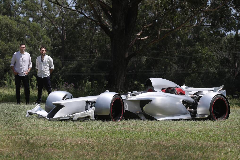 NEED FOR SPEED: Organiser of Berry Motorfair Jordan Tang and Zac Mihajlovic and his home-made custom Formula One car. Photo: Robert Peet