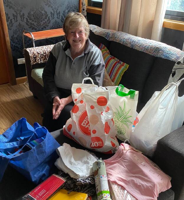 COMMUNITY: CWA Crookwell Evening Branch secretary, Jeanette Painter with some of the supplies to be sent to PNG. Photo supplied. 
