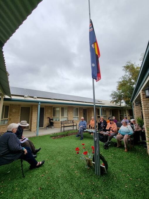 Paying respects: Ingenia Gardens residents pay their respects to the ANZACs including First Nations servicemen last week. Picture: supplied. 