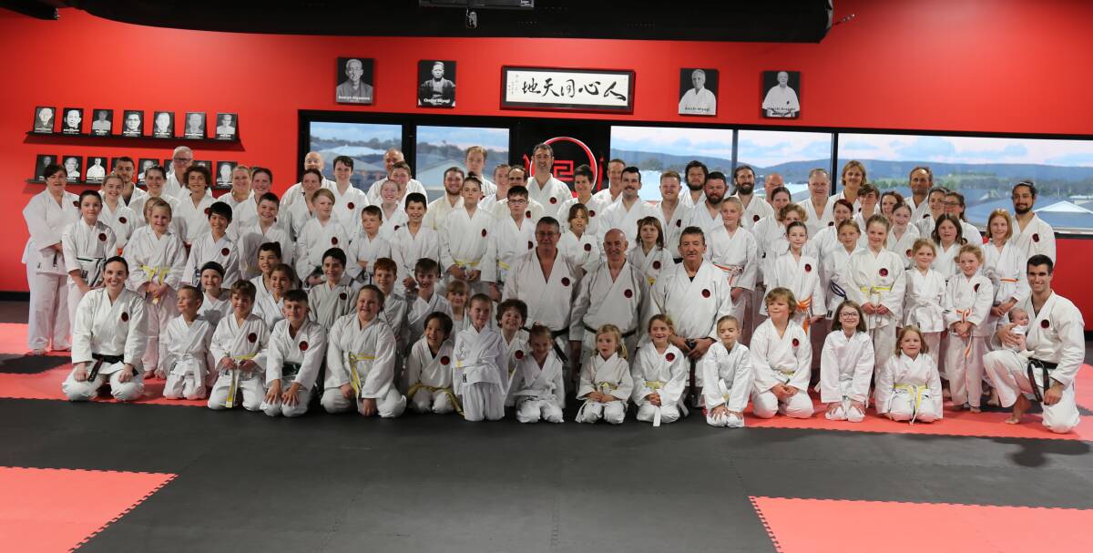 The full complement of students and instructors at the opening on Monday, just a day after being named Australian national champions. 