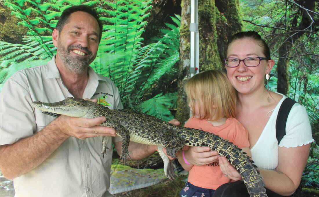 Kev the Croc Catcher with Ami McAviney and Zaree Hill as part of the Apple Festival celebrations. Photo: Sophie Bennett