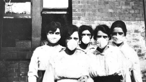 Nurses wearing masks during the Spanish Flu. PHOTO: State Library of Queensland
