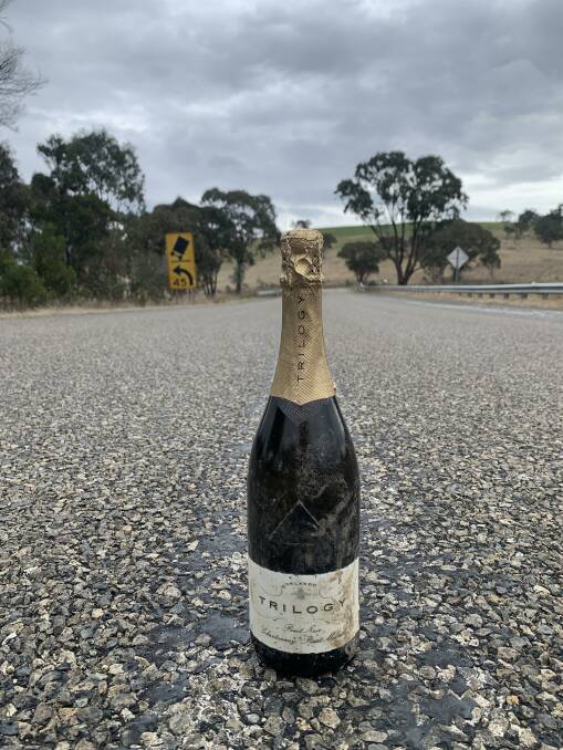 One of the few remaining bottles of sparkling pinot noir salvaged from the truck crash. Picture: Tim the Yowie Man