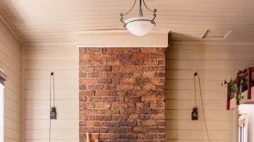 Carefully detailing ensured the charm of the original charred brickwork was retained. Picture by Light and Lines  