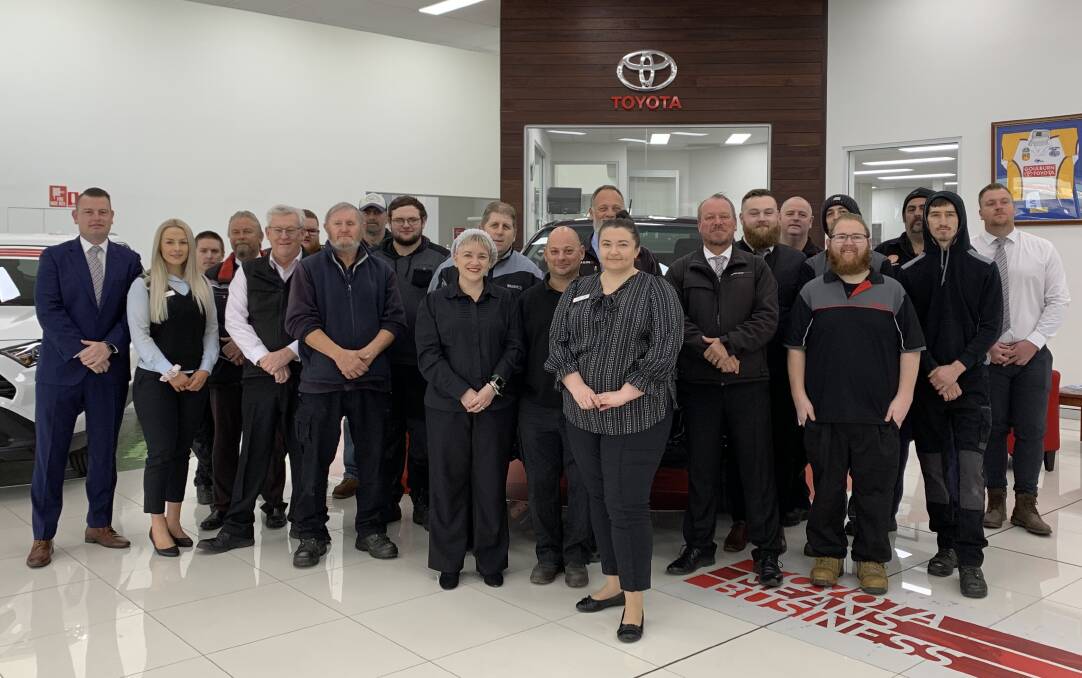 The team: Mr Albrighton says "We have 23 staff, all of whom are local and we are very proud of that. Their roles are wide and varied from new and used car sales, service, finance, parts, stock control and admin". Photo: Supplied.