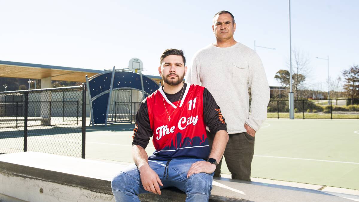 Richie Allan with his son Richard, who has been a victim of racist abuse at basketball. Picture: Dion Georgopoulos