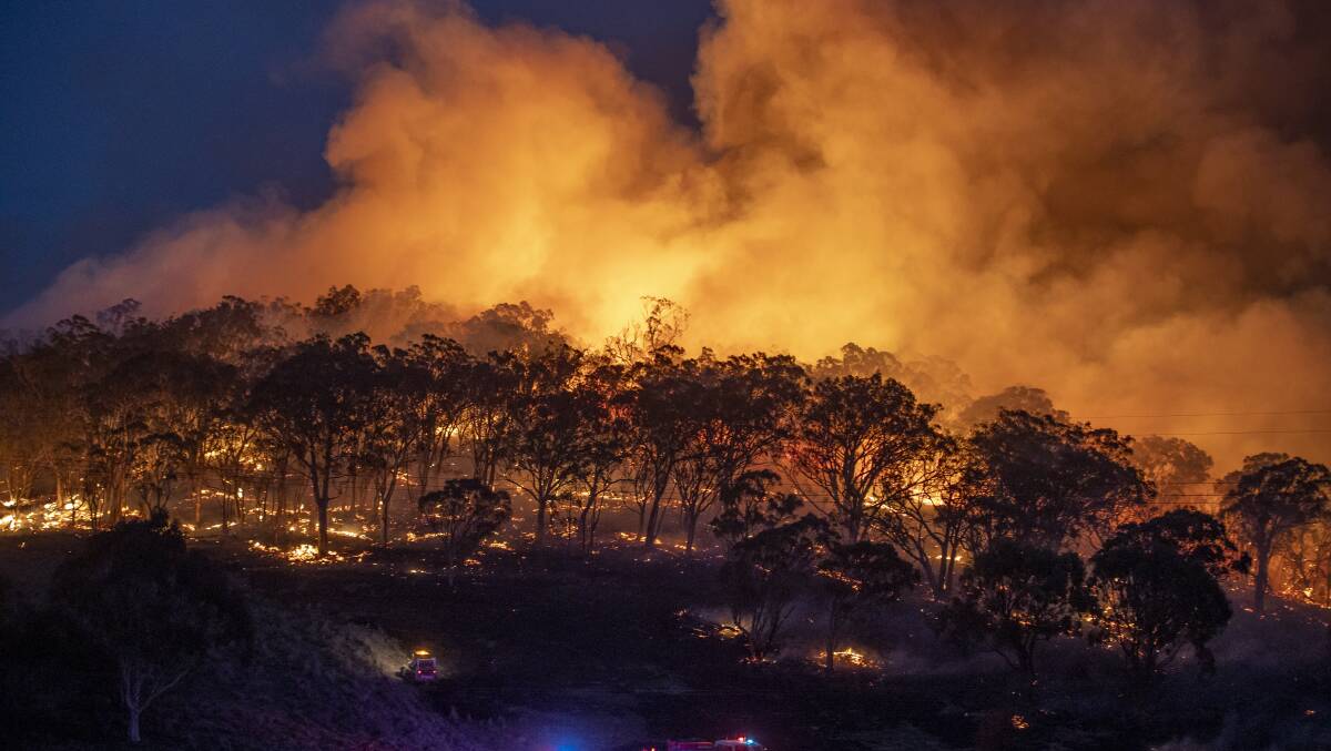 Australian states are preparing for bushfires but the federal opposition says the government has left money unspent. Picture: Sitthixay Ditthavong