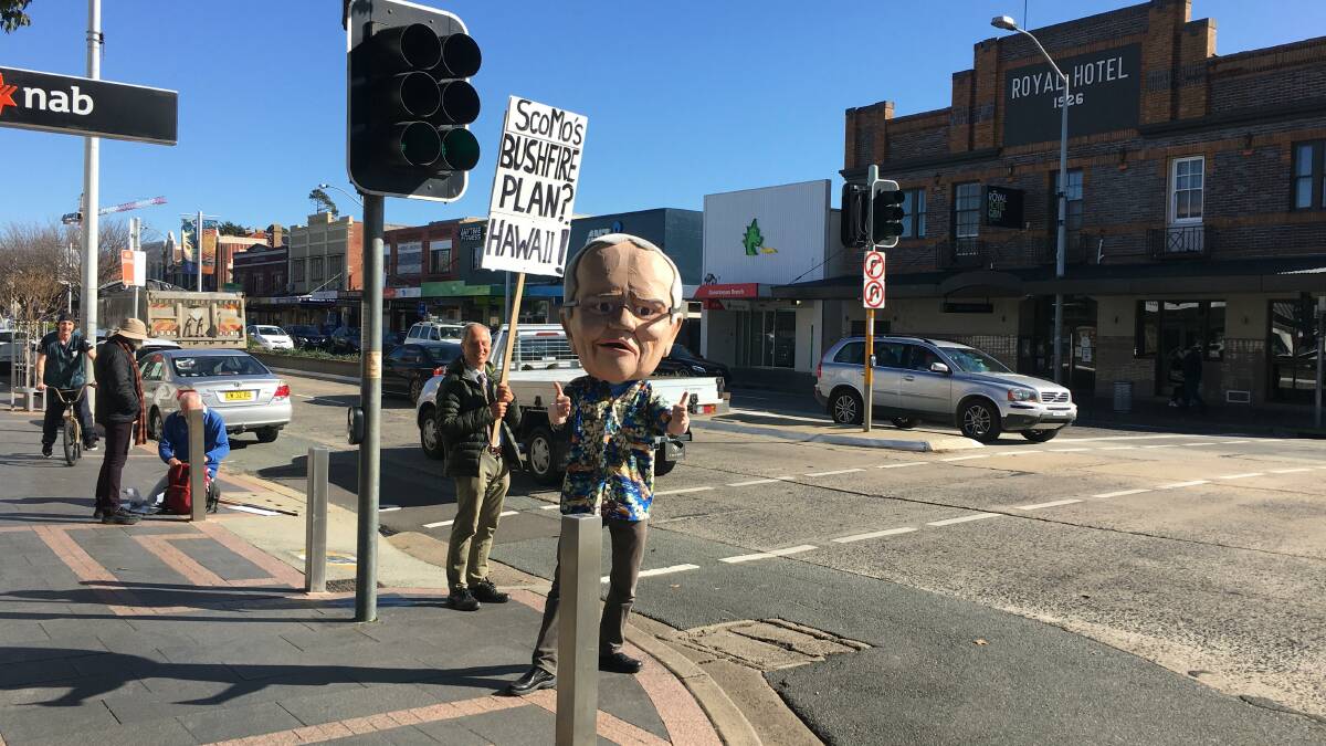 A familiar big head in Queanbeyan on polling day. Picture: Peter Brewer
