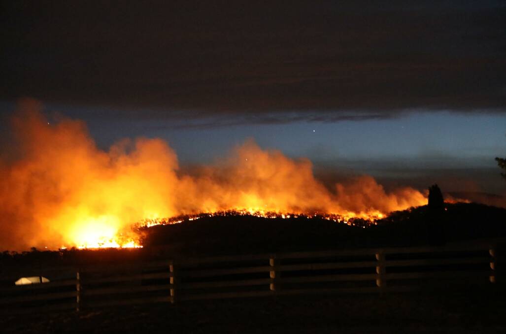 The North Black Range fire burning fiercely at night. Picture: Robbie Wallace