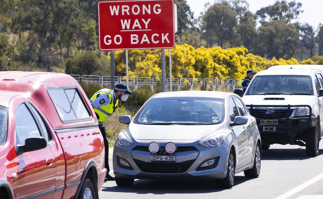 ACT Policing have been working with the NSW police force to enforce COVID compliance measures between the jurisdications. Picture: Keegan Carroll