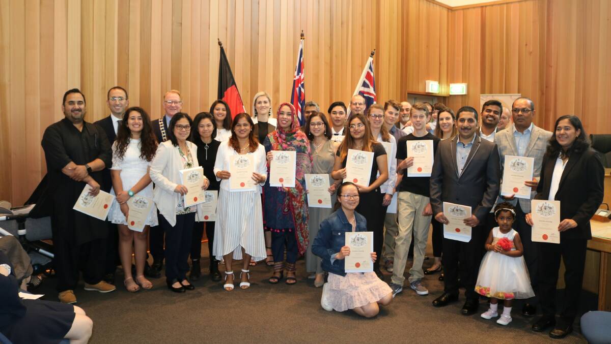 NEW FRIENDS: On Tuesday morning, 30 residents became new Australian citizens at a ceremony in the Council Chambers.