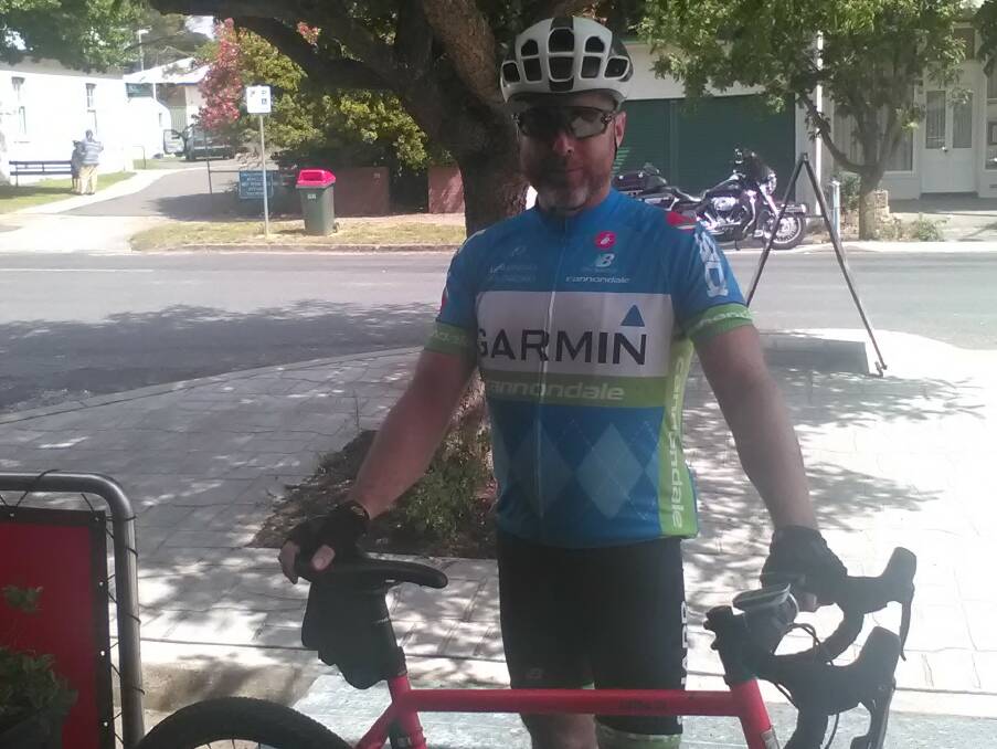 HARD BUT FUN: Tim Parker rides in from Canberra, after a gruelling gravel journey. Photo: Bernie Boyce.