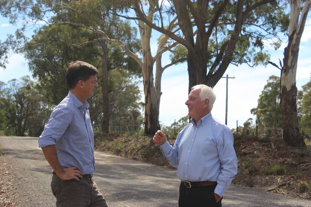 Hume MP Angus Taylor and Upper Lachlan Shire mayor John Stafford.