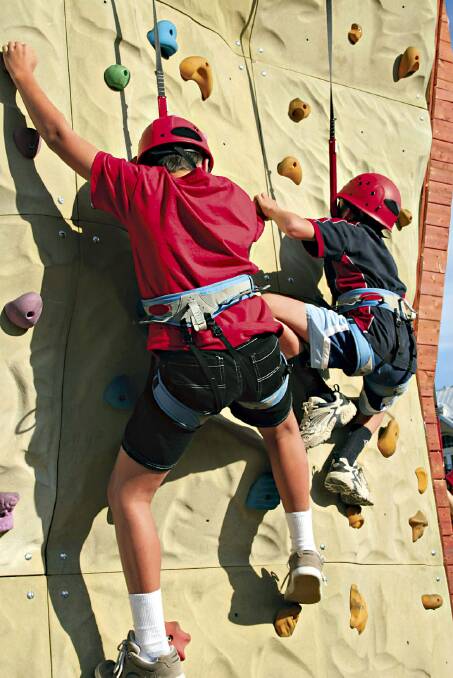 stretch yourself: A climbing wall, bungee run and inflatable rides will be part of a Youth Week celebration on April 13.