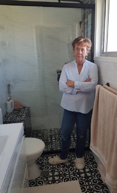 Lana Gardiner in her recently renovated bathroom - she believes grants for projects such as hers would have been a more equitable target.