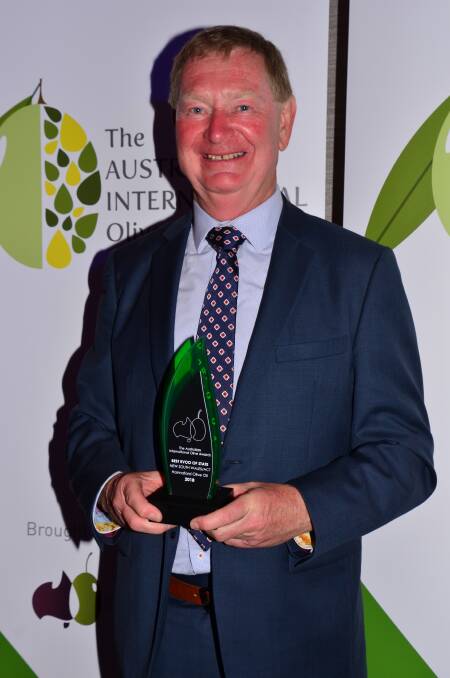 CONGRATULATIONS: David Hannaford with the top honour won at the Australian International Olive Oil Awards. 