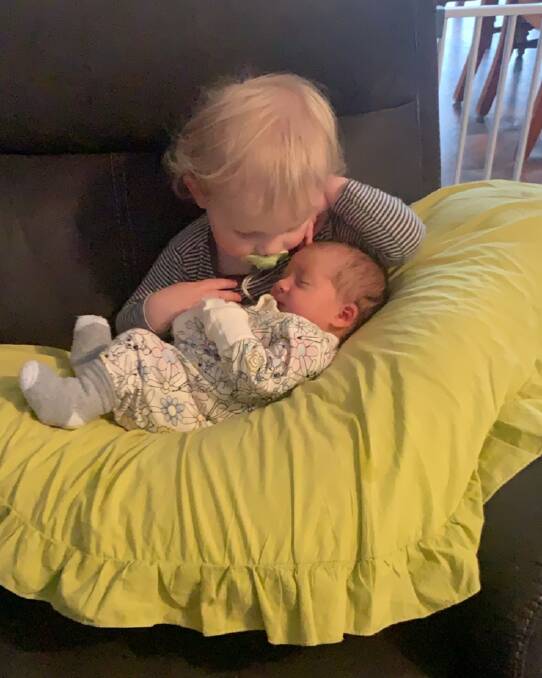 Laine welcoming his new baby sister.
