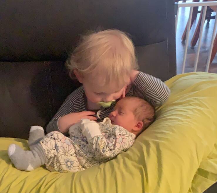 Laine welcoming his new baby sister.