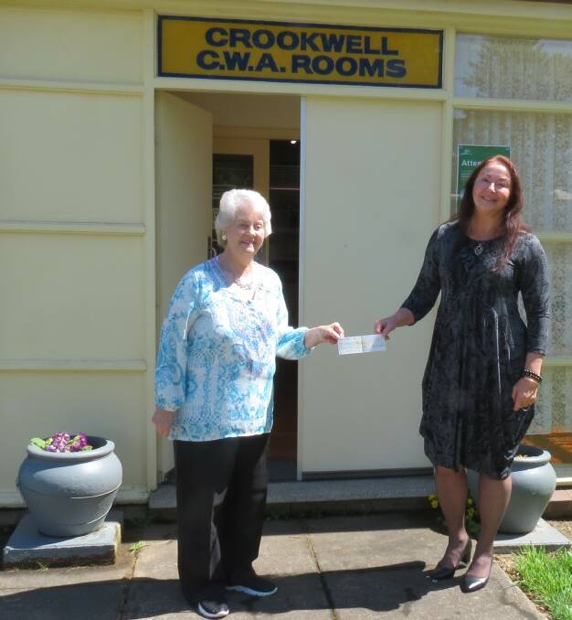SUPPORT: President of Crookwell CWA Day Branch Lillian Marshall presenting a $700 cheque to CEO and Founder of The Equanimity Project Karen Levin to assist with Nurture Carer Training.