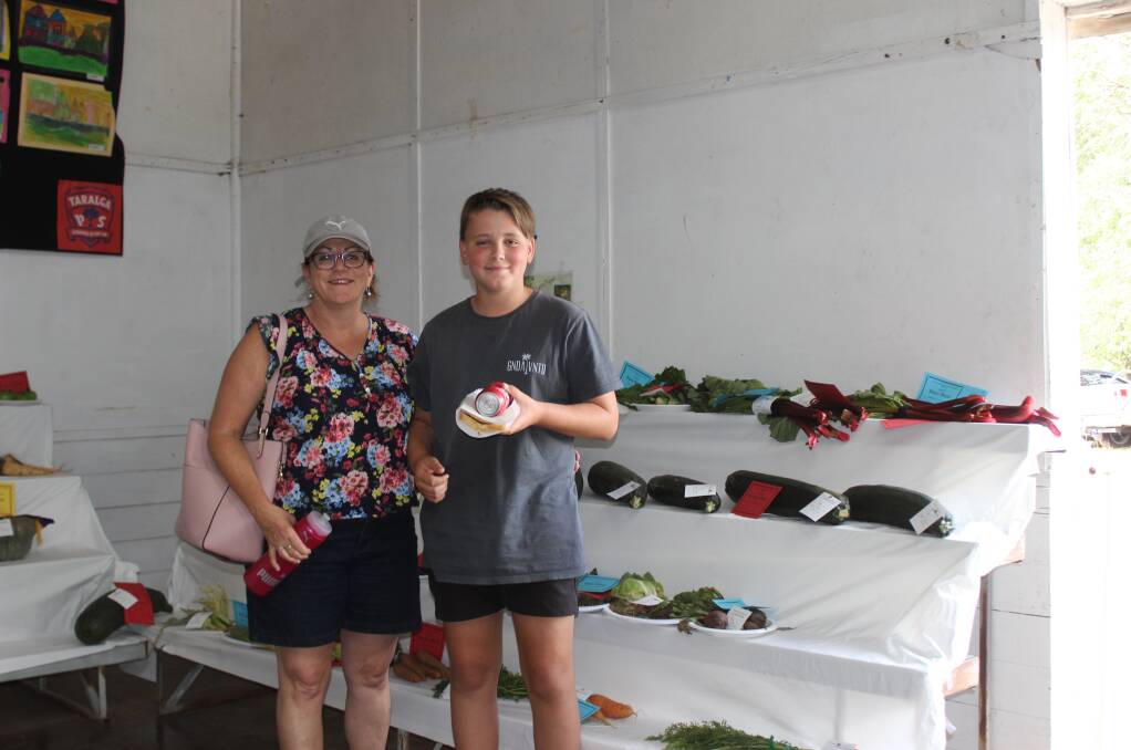 TOP PRODUCE: Jill Woodside and her son Jai were impressed with the baskets of vegetables at the show.
