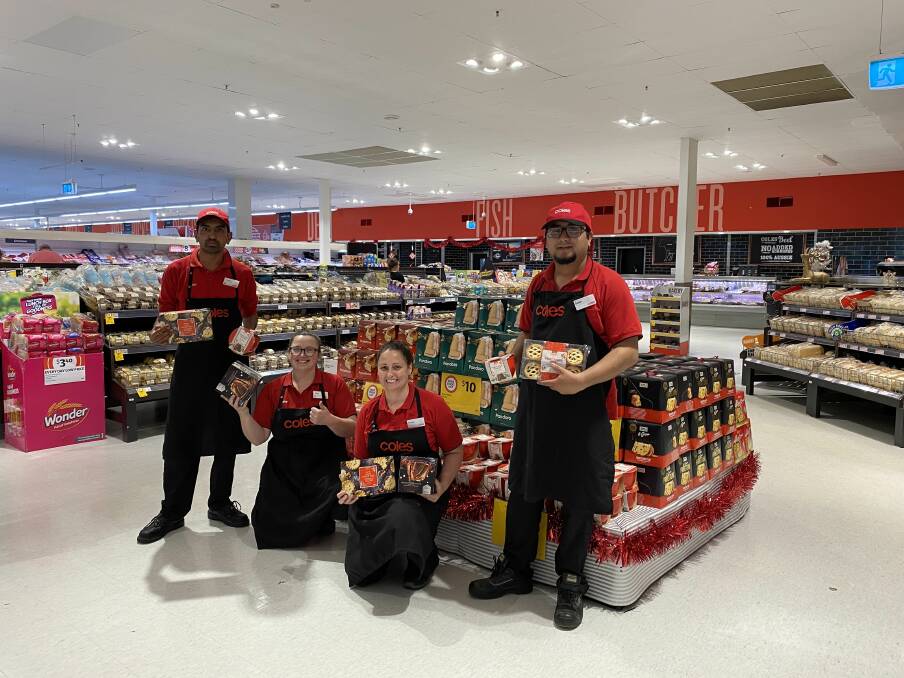 Bowral Coles team members Suman Bohara, Abby Jenkins, Cassie Weaks and Sabin Pandey with some of the mince pies the locals are stocking up on. Photo: supplied