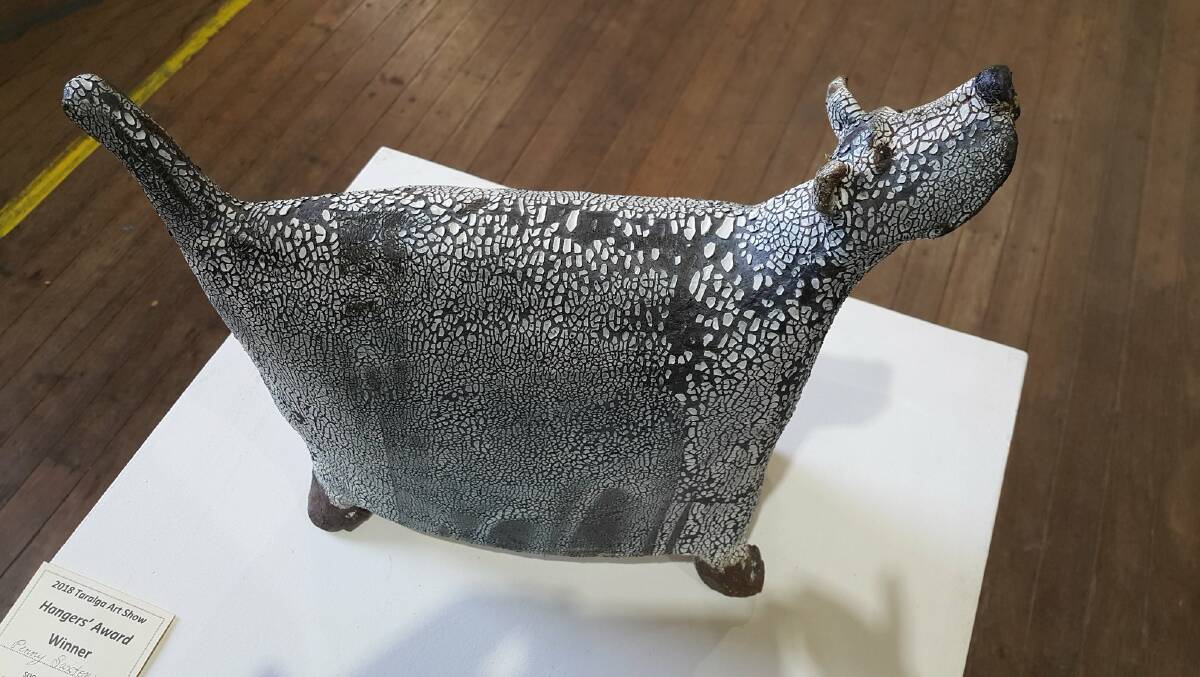 DOG LOVERS: Penny Saxton's 'Hound' won the Hangers' Choice Award at this year's Taralga Art Show.