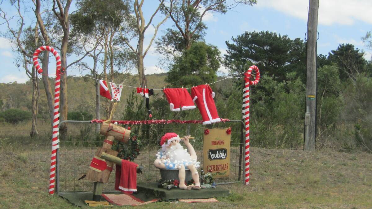 TOP SPOT: The winners of the Towrang Yuletide Mail Trail were Jenny and Alan Goulder for their bubbly Christmas spirit entry. Photo: supplied.
