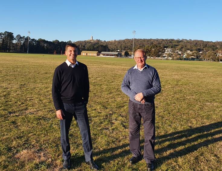 Angus Taylor MP and Goulburn Mulwaree mayor Bob Kirk at Carr Confoy Fields, one of the spaces that will be drought-proofed through the waste water reuse scheme.