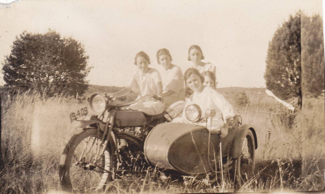 PILE IN: Herbert Rumsey's daughters and their friends on holiday at Tallong. Photo: Rumsey family collection.