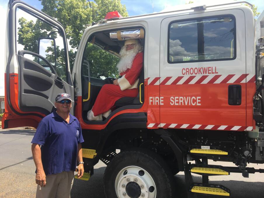 NICE WHEELS: If the reindeer are resting, Santa often uses the Rural Fire Service vehicles to make an entrance at Christmas events.
